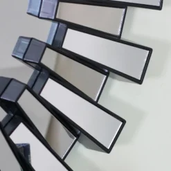 Northlight 25.5" Round Matte Black Aztec Sunburst Wall Mirror